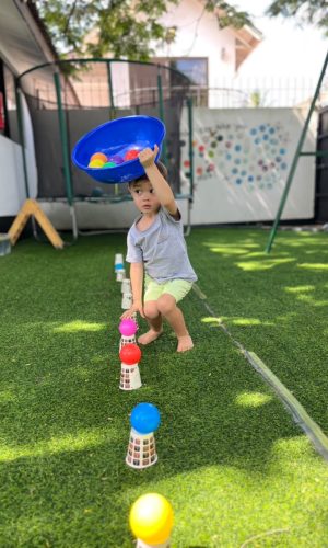 Wonderwell - Child balancing outside
